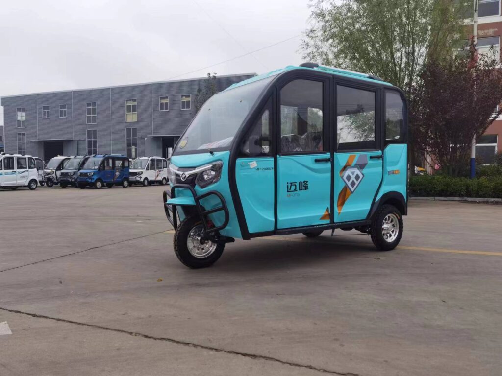 Enclosed tuk tuk car