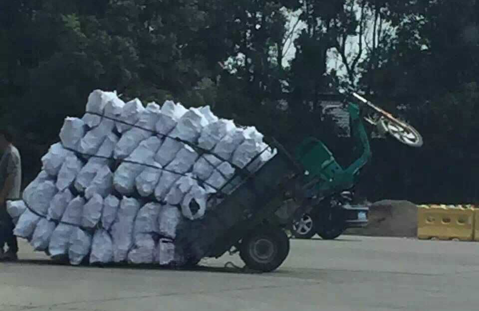 Electric tricycle overloaded