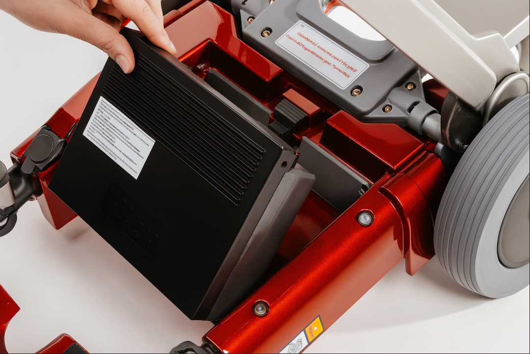 An illustration comparing an under-seat battery compartment and a removable battery pack