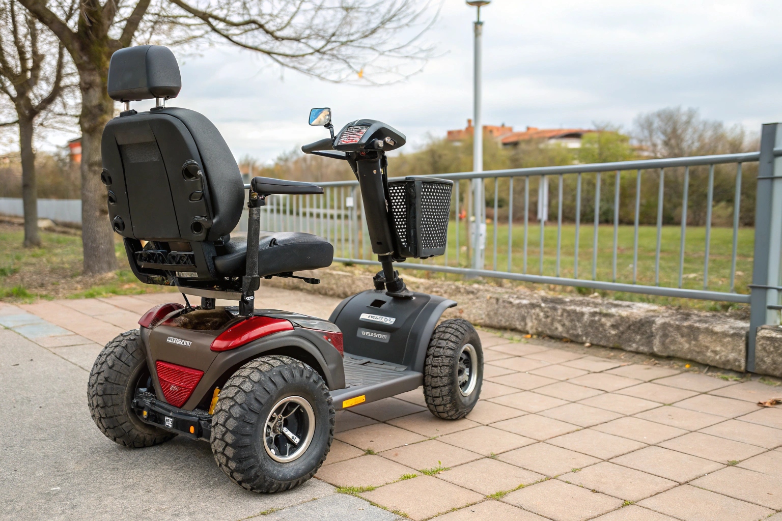 a mobility scooter with large wheels on a cobblestone street vs one with small wheels in a modern shopping mall