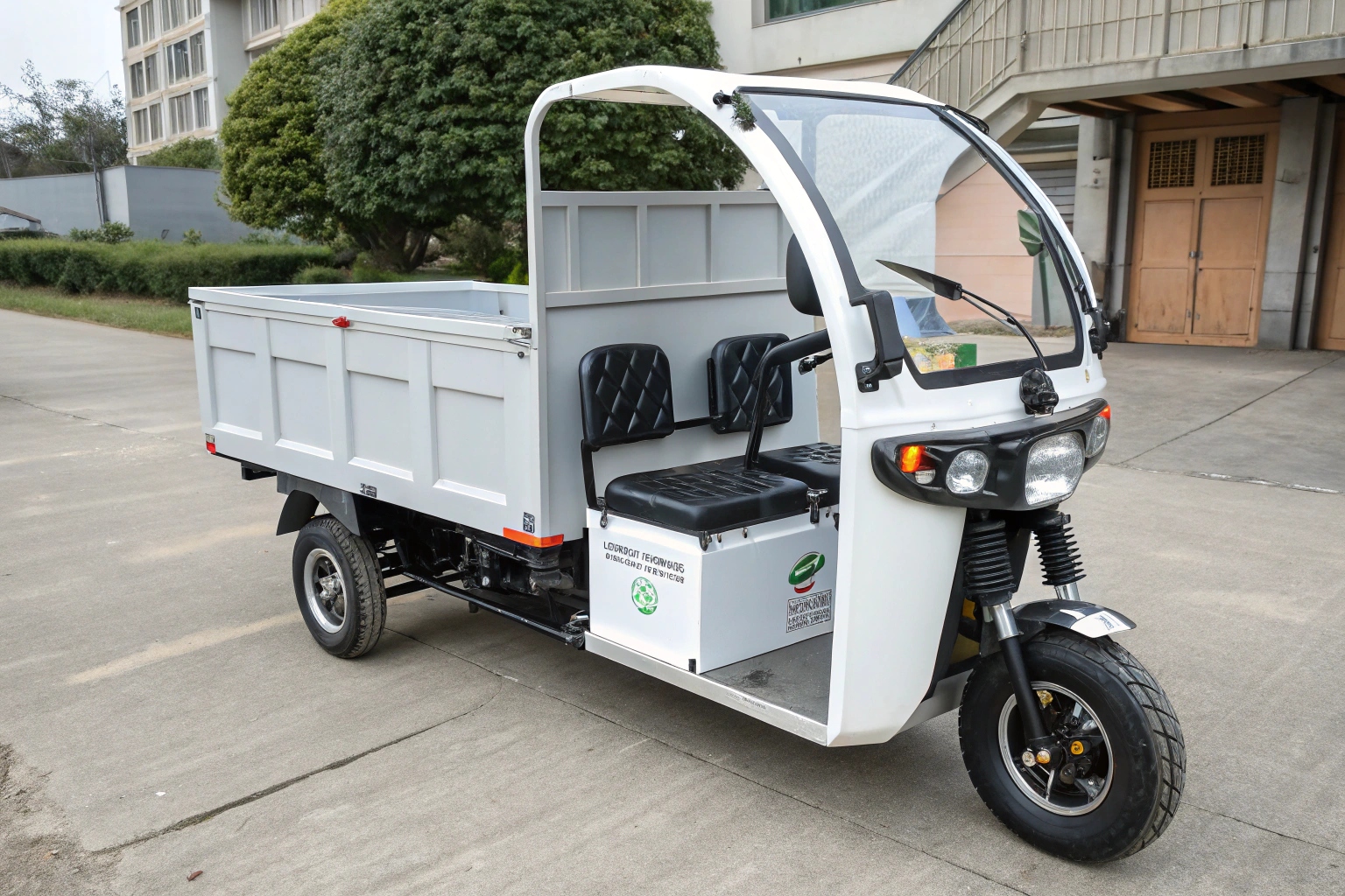 a close-up of a stainless steel cargo bed and waterproof electrical connectors on an electric trike