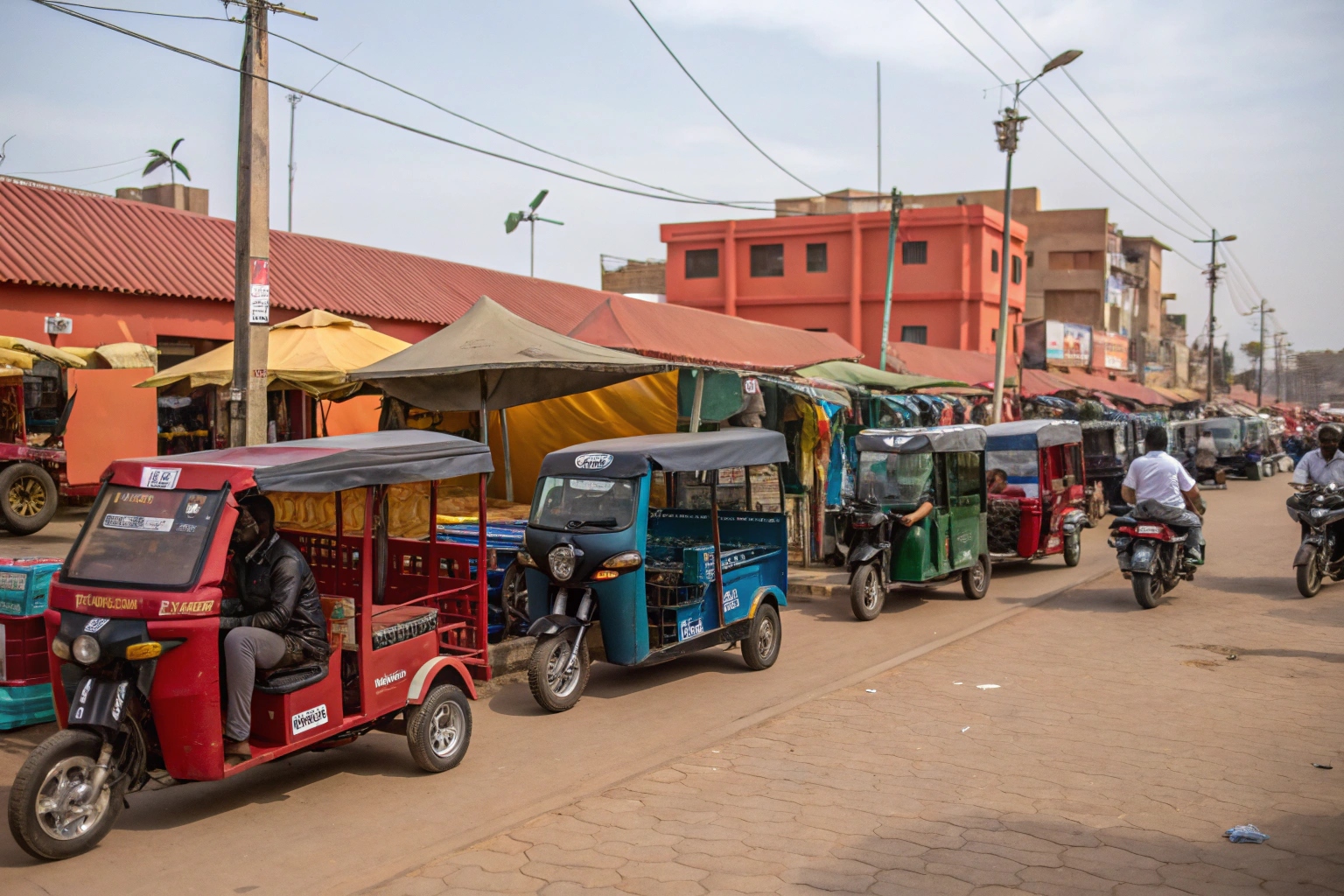 an electric utility vehicle parked in front of a warehouse in Lagos, Nigeria