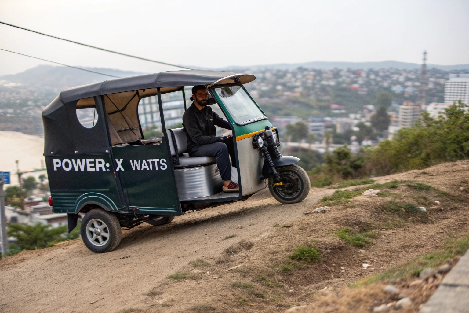 A cutaway view showing the electric motor of a passenger tuk-tuk