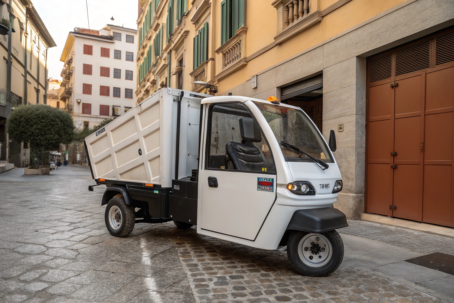 a small electric garbage truck easily turning in a narrow alley in an asian city