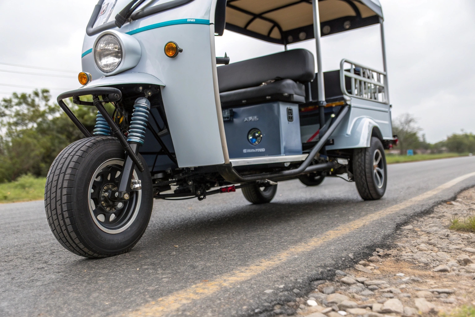 Passengers enjoying a smooth, comfortable ride in an electric tuk tuk