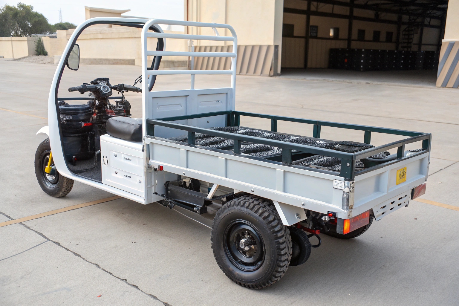 a close-up view of the rear suspension and motor of an electric cargo trike