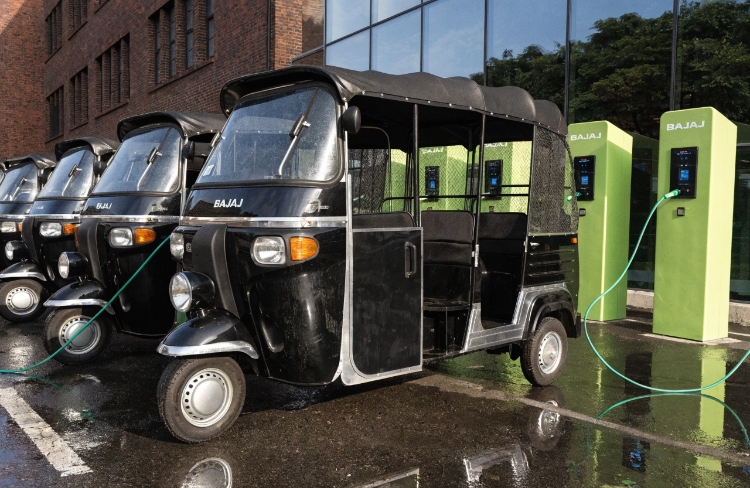 electric passenger tricycle charging stations at a depot